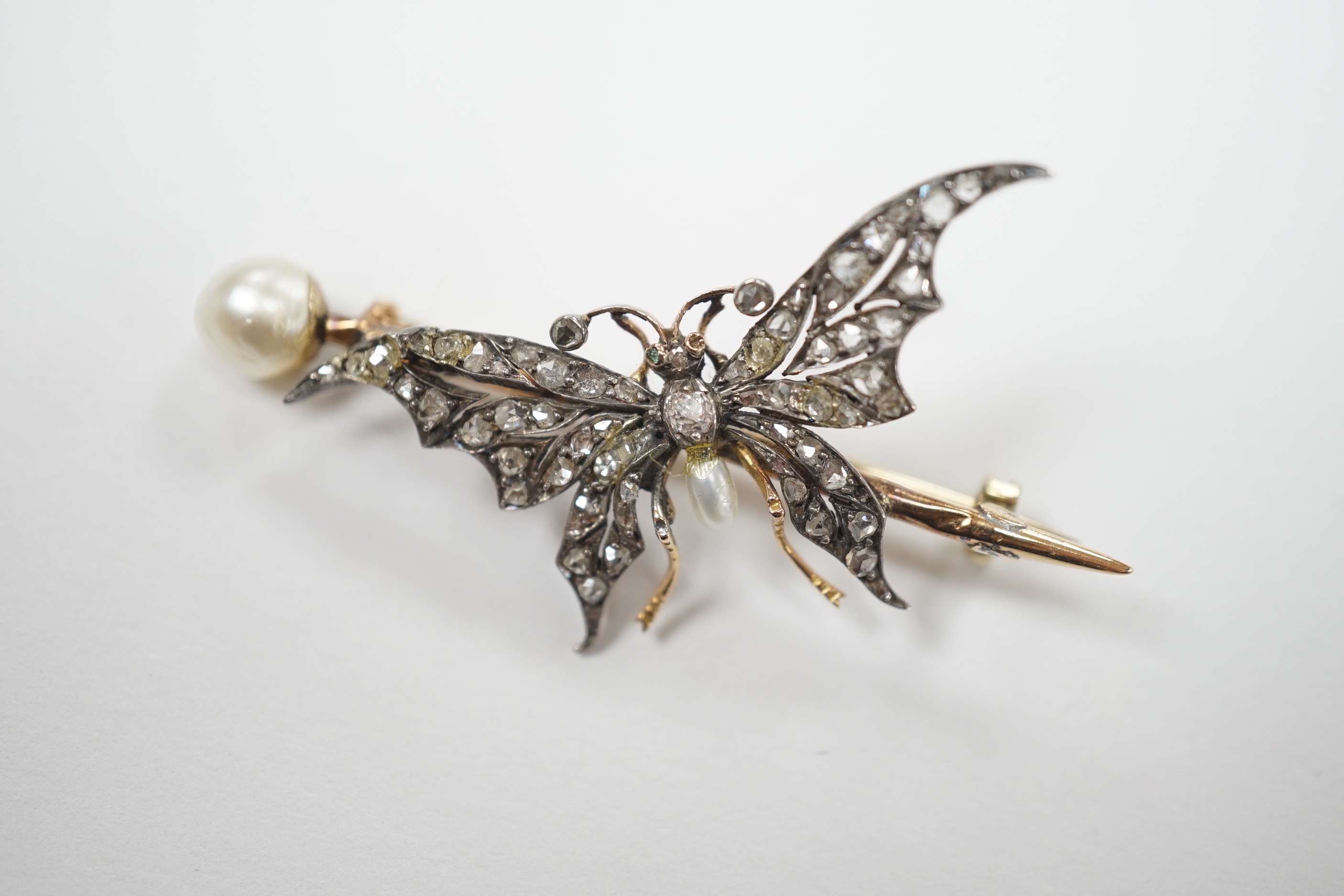 A late Victorian yellow metal baroque pearl drop and rose cut diamond cluster set bug brooch, 48mm, gross weight 4.2 grams, in fitted leather case (a.f.).